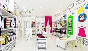 una-tienda-de-ropa-infantil-que-parece-sacada-de-las-paginas-de-un-cuento.jpg