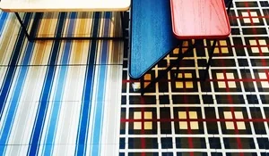 Baldosas hidráulicas de El Mosaísta con estampado textil