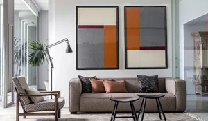 Decorar la pared con dos cuadros simétricos