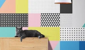 Collage con papeles lisos y estampados geométricos