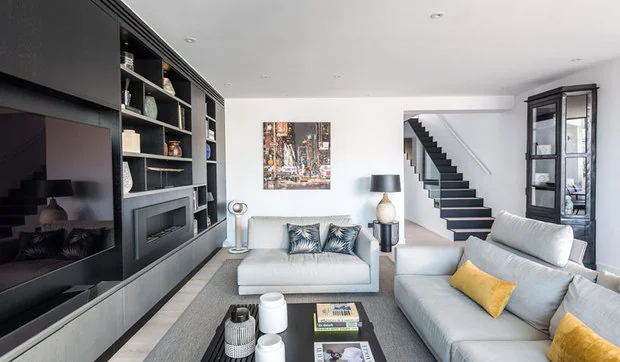 Ático-dúplex familiar con elegantes toques de diseño y tres terrazas