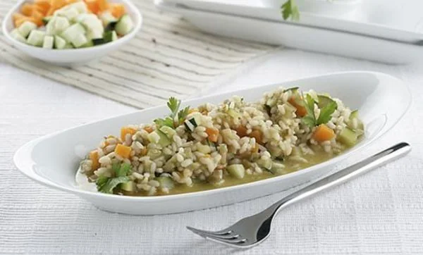 Arroz meloso de berenjena, calabaza y calabacín