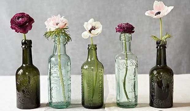 Botellas de cristal recicladas en jarrones