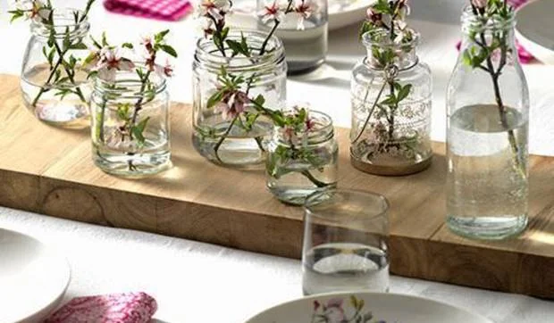 Centro de mesa reciclando tarros de cristal