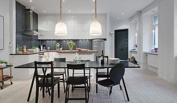 Moderna y espaciosa cocina con comedor y abierta al salón