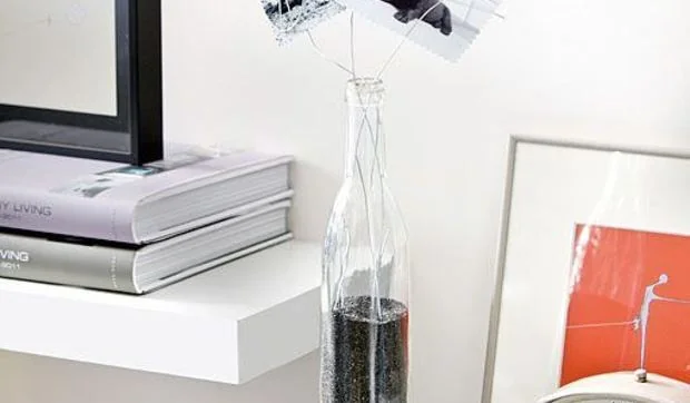 Cómo hacer un portafotos con una botella