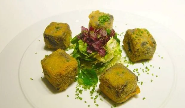 Croquetas de calamares en su tinta