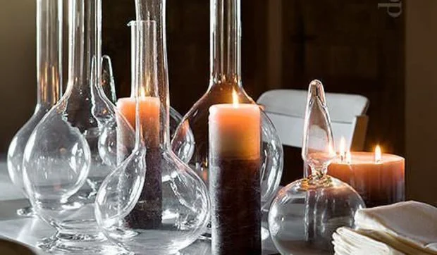 Decorar la mesa con cristal y velas
