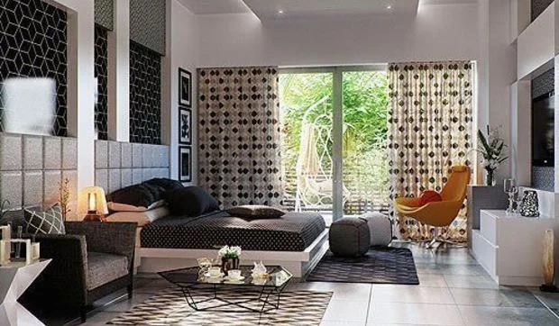 Un dormitorio en gris con tres ambientes diferenciados