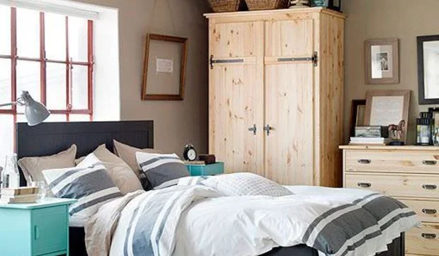 Dormitorio en tonos naturales y azules