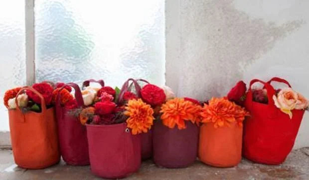 Macetas en cestas de tela