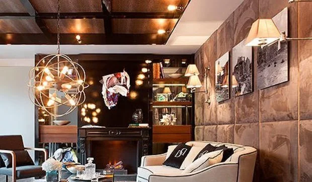 Salón con zona de trabajo en un ambiente masculino y sofisticado