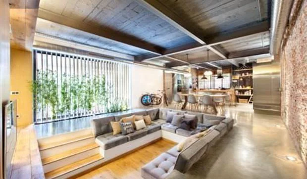 Un bajo comercial convertido en un loft industrial