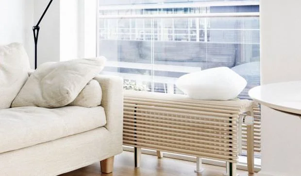 Un banco para cubrir el radiador