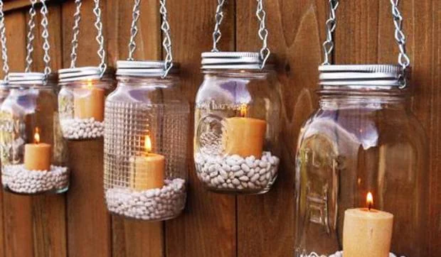 Velas en tarros de cristal para decorar la Navidad